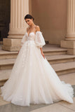 A-Line Ivory Appliqued Wedding Dress With Puff Sleeves